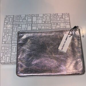 Comme des Garçons Metallic Silver Pouch men’s women’s unisex tolitery clutch gym